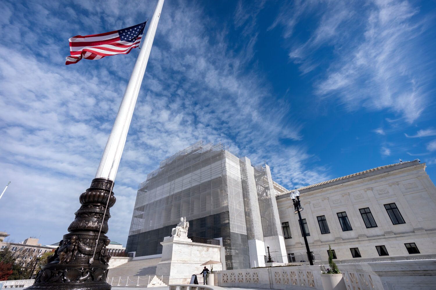 FILE -An American flag flies at half-staff outside the Supreme Court Nov. 5, 2025, in Washington. (...