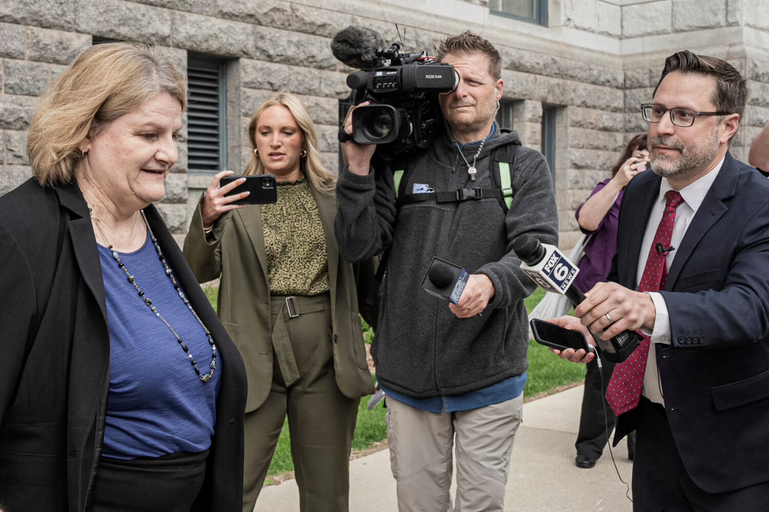 FILE - Milwaukee County Circuit Judge Hannah Dugan leaves the federal courthouse after a hearing in...