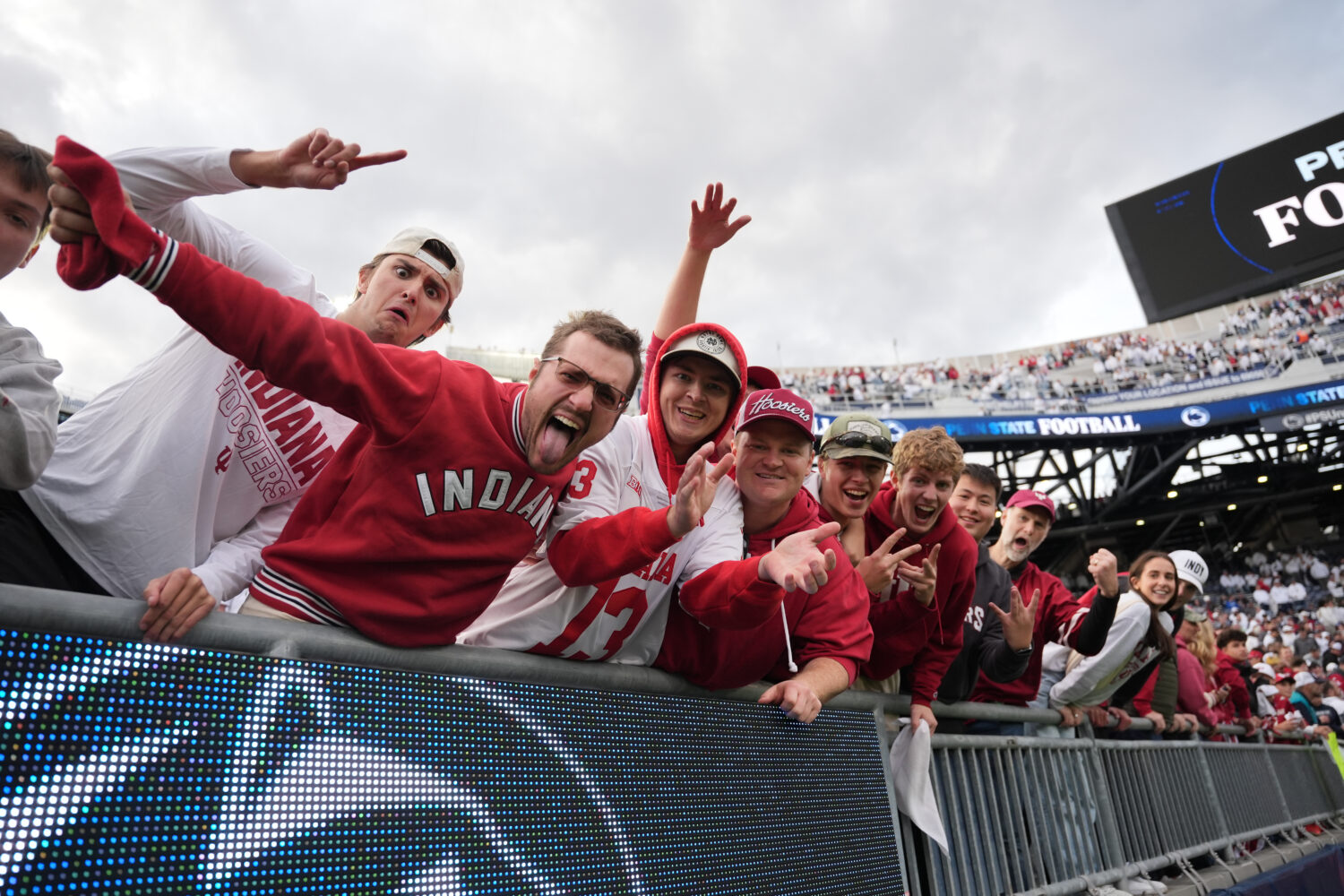 Indiana fans celebrate following an NCAA college football game against Penn State, Saturday, Nov. 8...