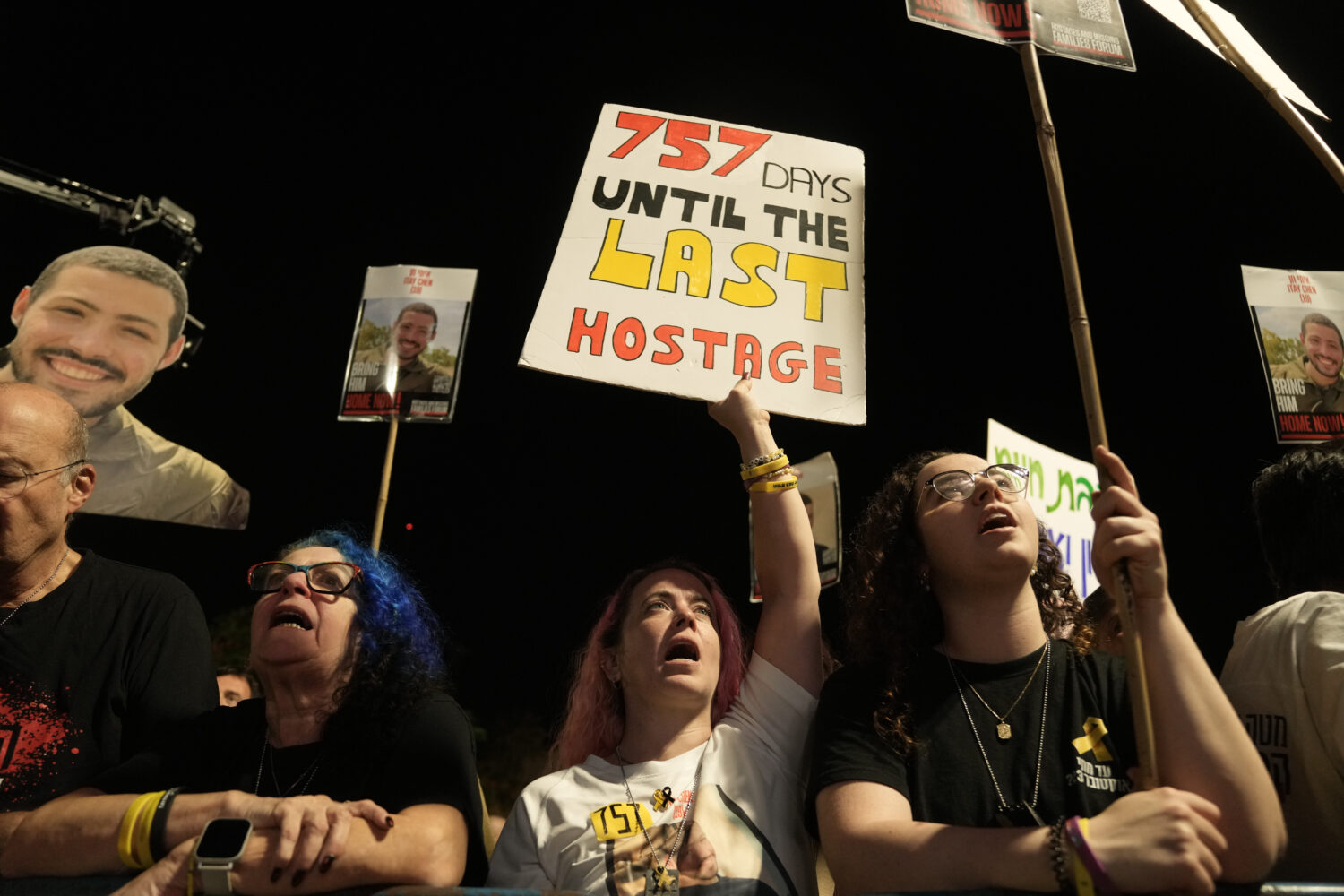 Relatives and supporters of hostages held by Hamas in the Gaza Strip attend a rally calling for the...