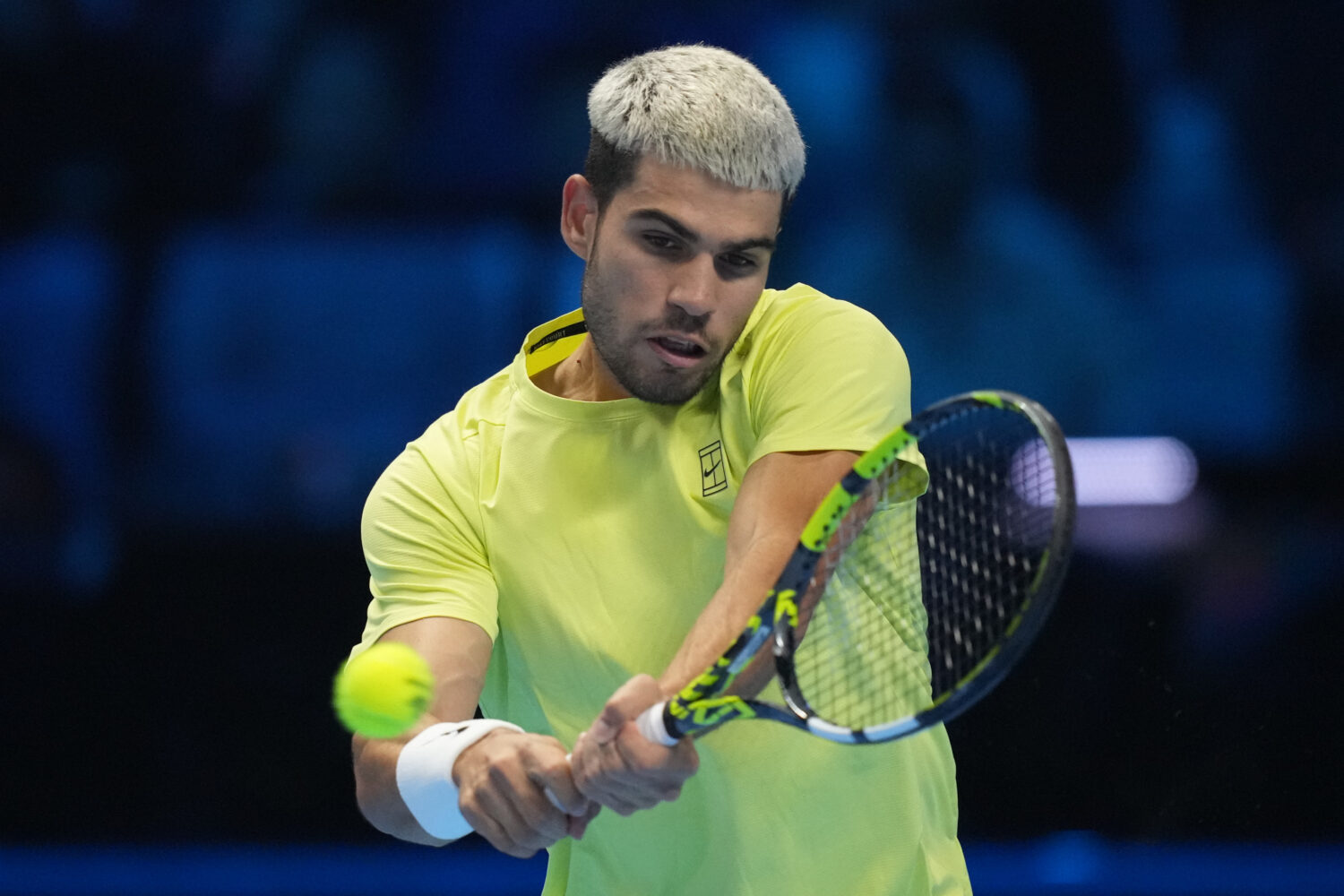 Spain's Carlos Alcaraz returns to Italy's Jannik Sinner during the final tennis match of the ATP Wo...