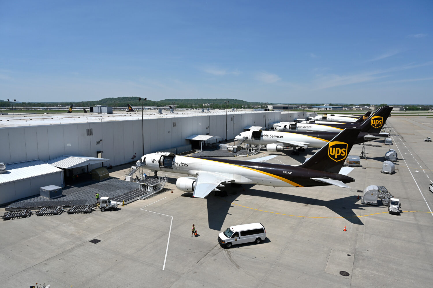 FILE - United Parcel Service transport jets wait to be loaded with packages at the UPS Worldport in...