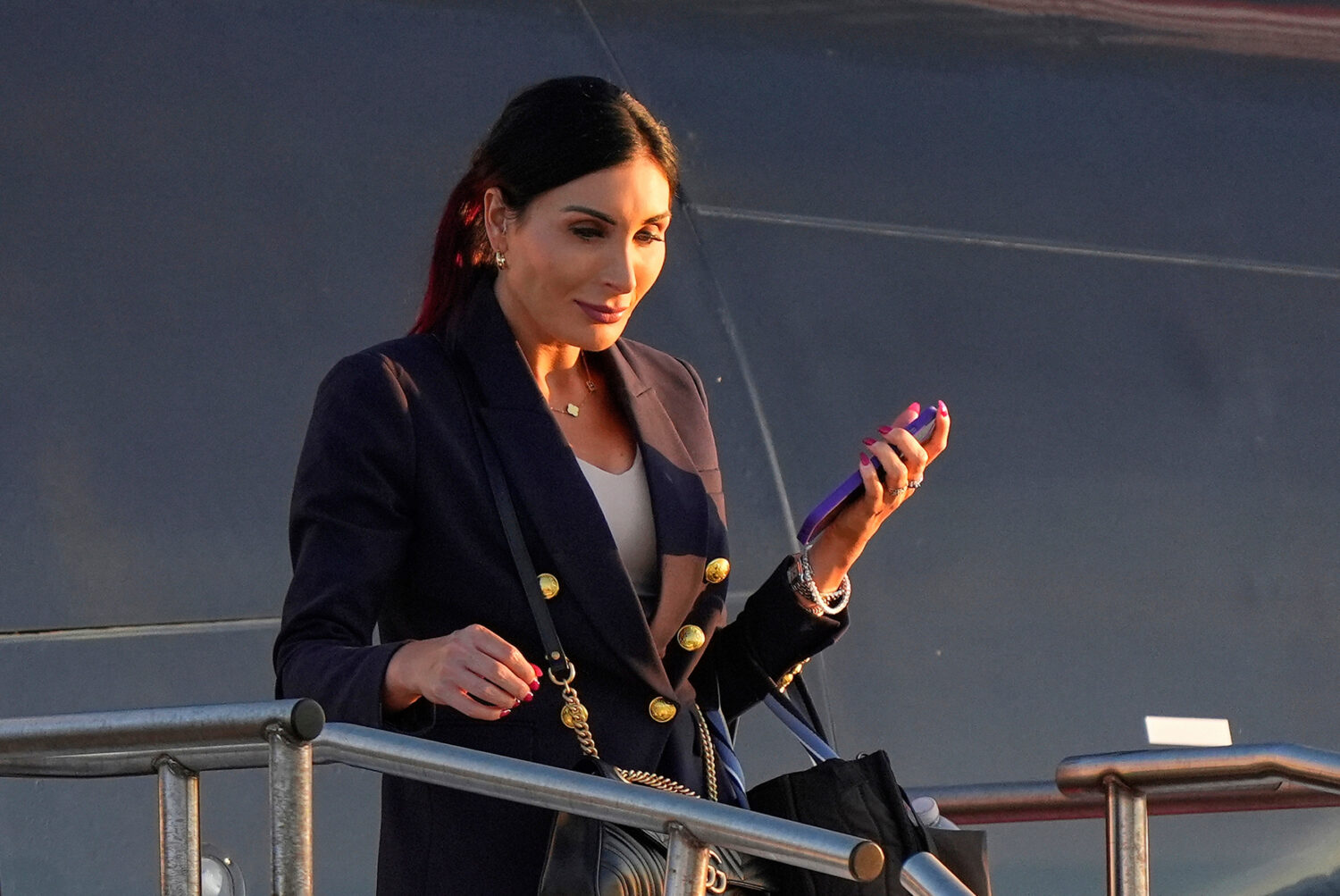 FILE - Laura Loomer arrives at Philadelphia International Airport, Sept. 10, 2024, in Philadelphia....