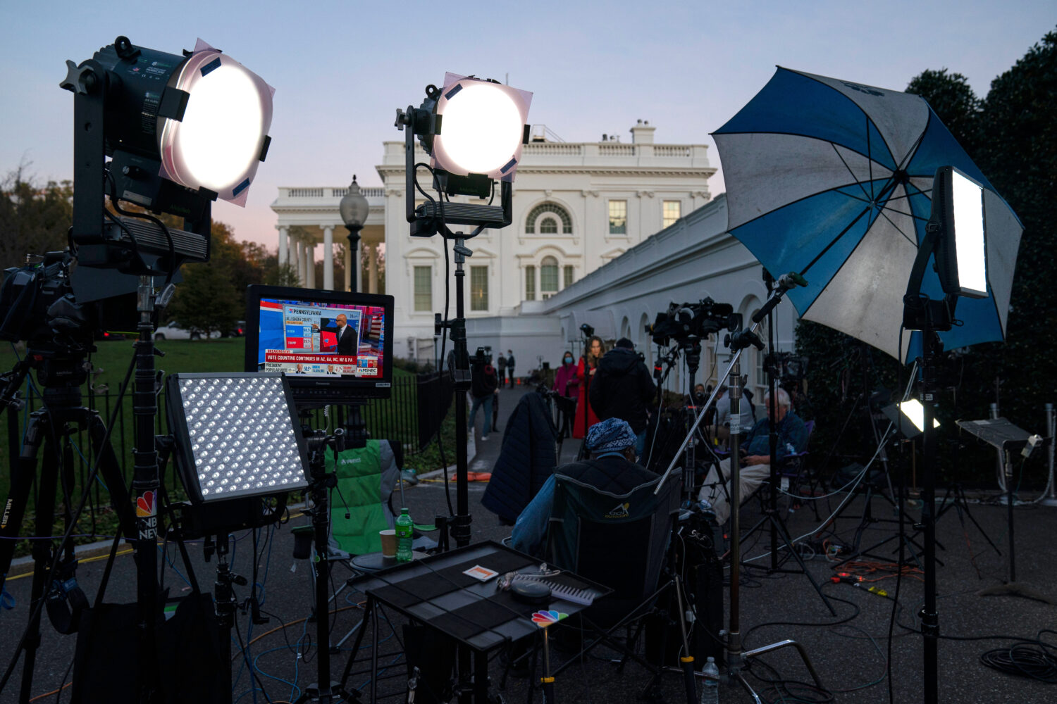 FILE - A feed from the MSNBC cable news channel is pictured on a monitor as media organizations set...