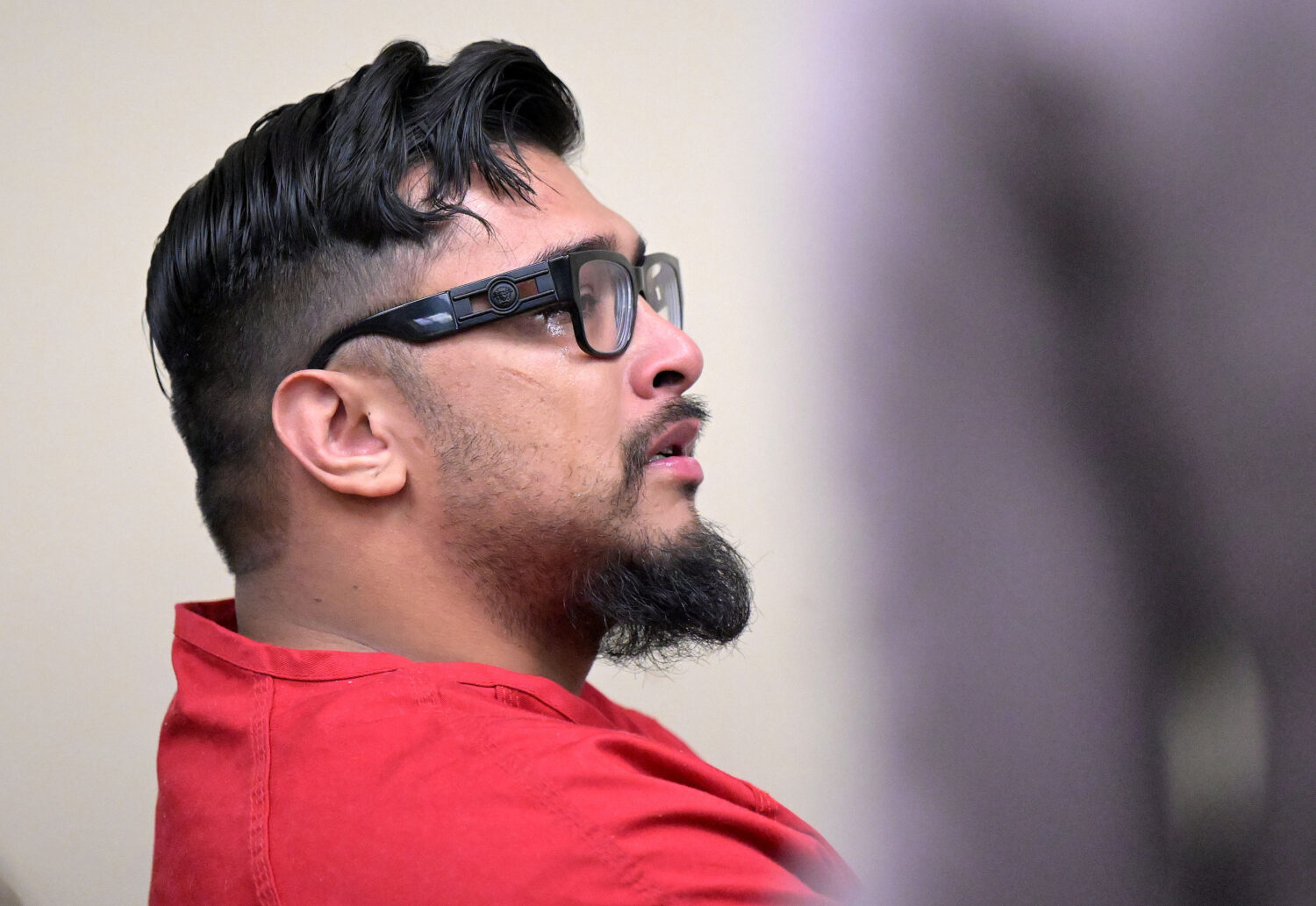 Jake Haro cries in court after pleading guilty to all charges, including second-degree murder of hi...