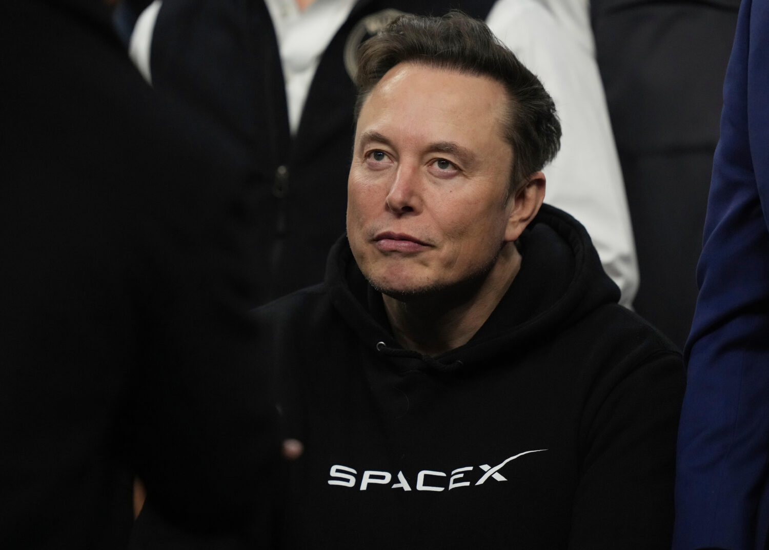 FILE - Elon Musk attends the finals for the NCAA wrestling championship, Saturday, March 22, 2025, ...