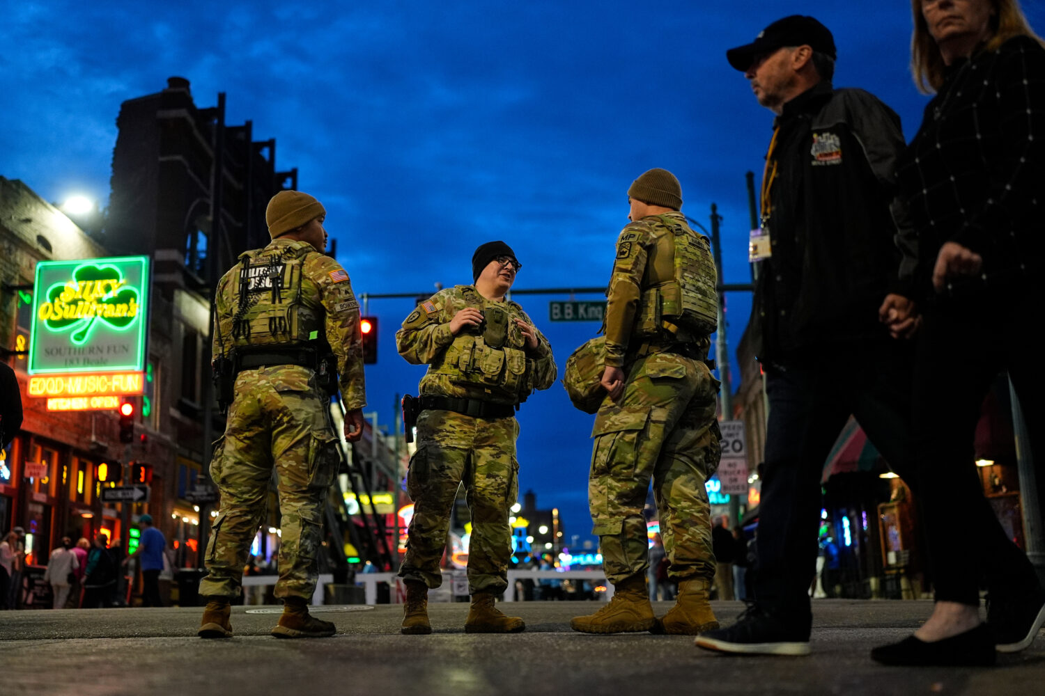 Members of the National Guard stand watch at the intersection of B.B. King Blvd. and Beale Street, ...