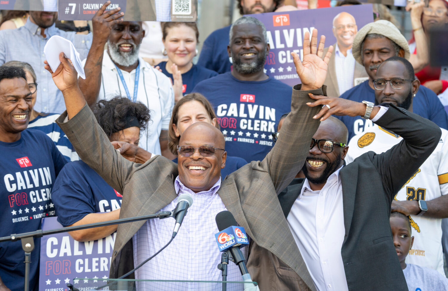 FILE - Calvin Duncan, center, stands with supporters on the steps of Orleans Parish Criminal Court ...