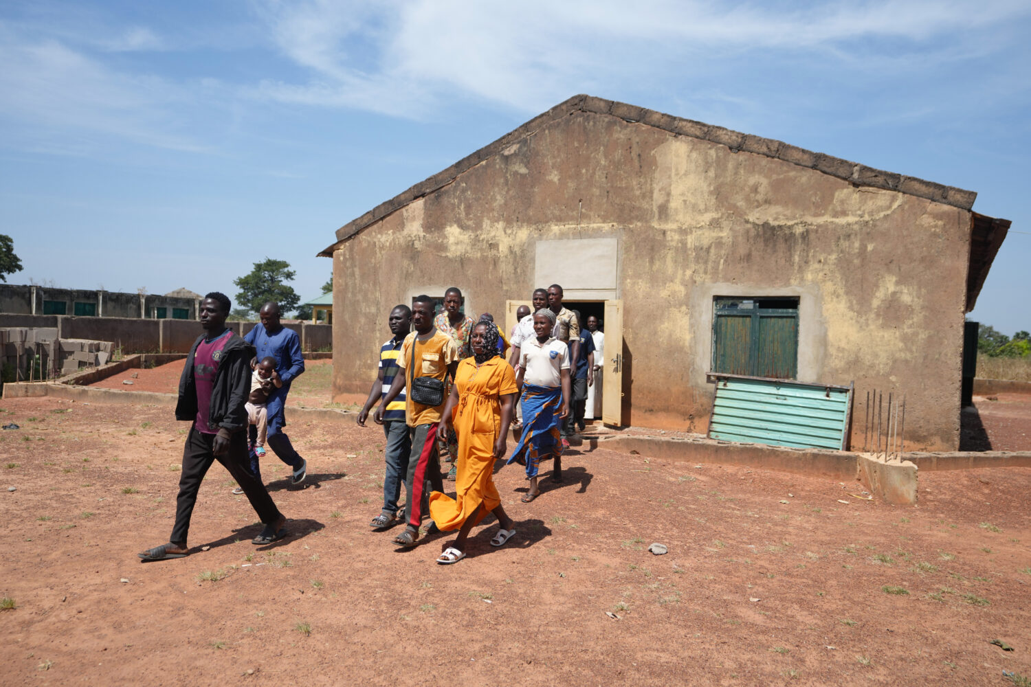 People who were kidnapped during a church service in November 2024 leave after a church meeting in ...