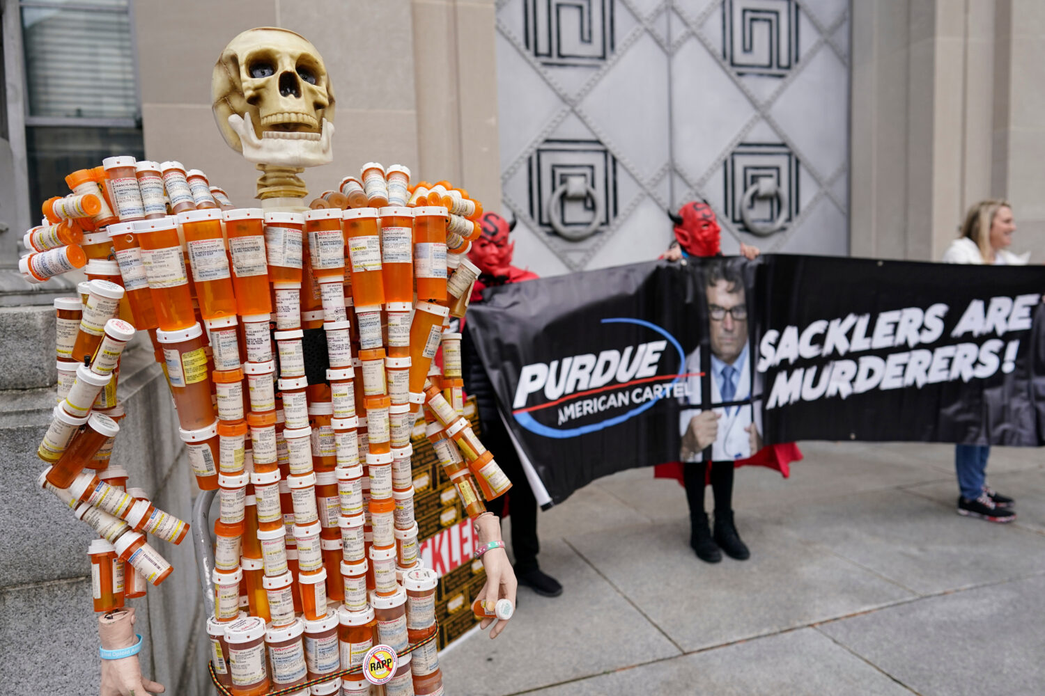 FILE - "Pill Man" made by Frank Huntley of Worcester, Mass., from his opioid prescription pill bott...