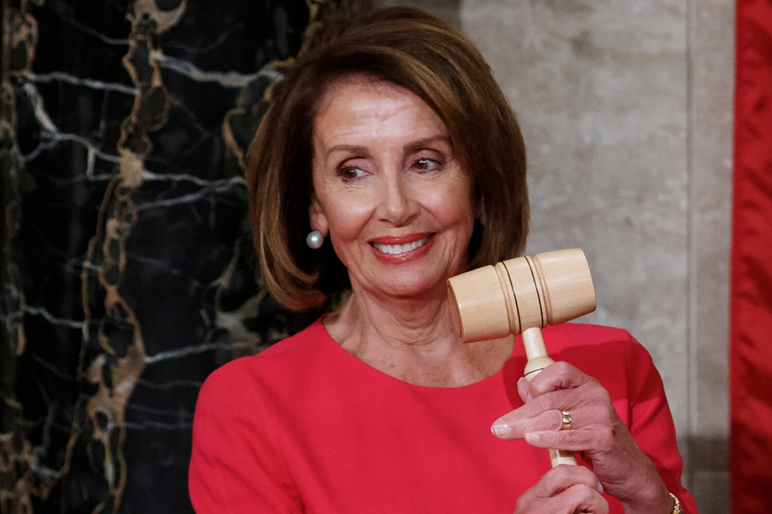FILE - House Speaker Nancy Pelosi of California holds the gavel at the Capitol in Washington, Jan. ...