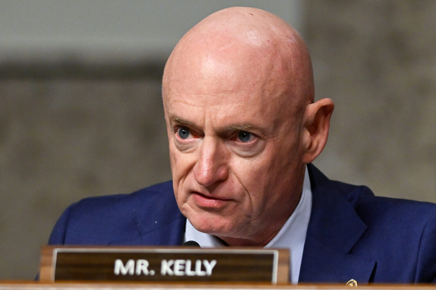 FILE - Sen. Mark Kelly, D-Ariz., speaks during a Senate Intelligence Committee hearing, at the Capi...
