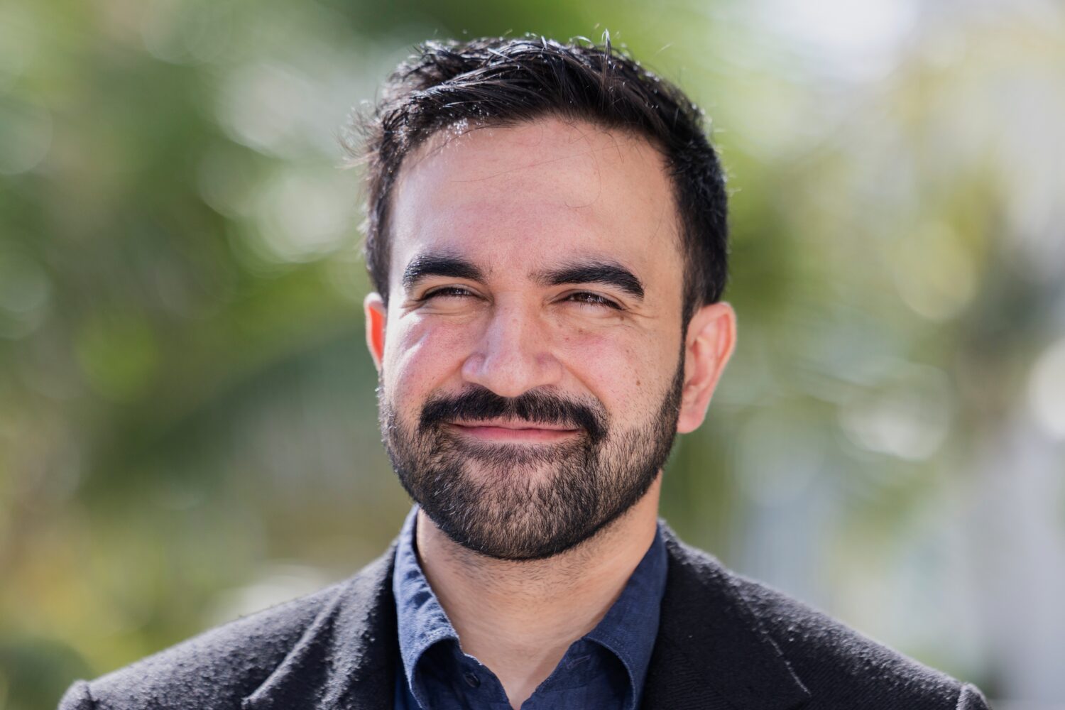 New York City Mayor-elect Zohran Mamdani departs El Hotel Caribe Hilton after attending the SOMOS P...