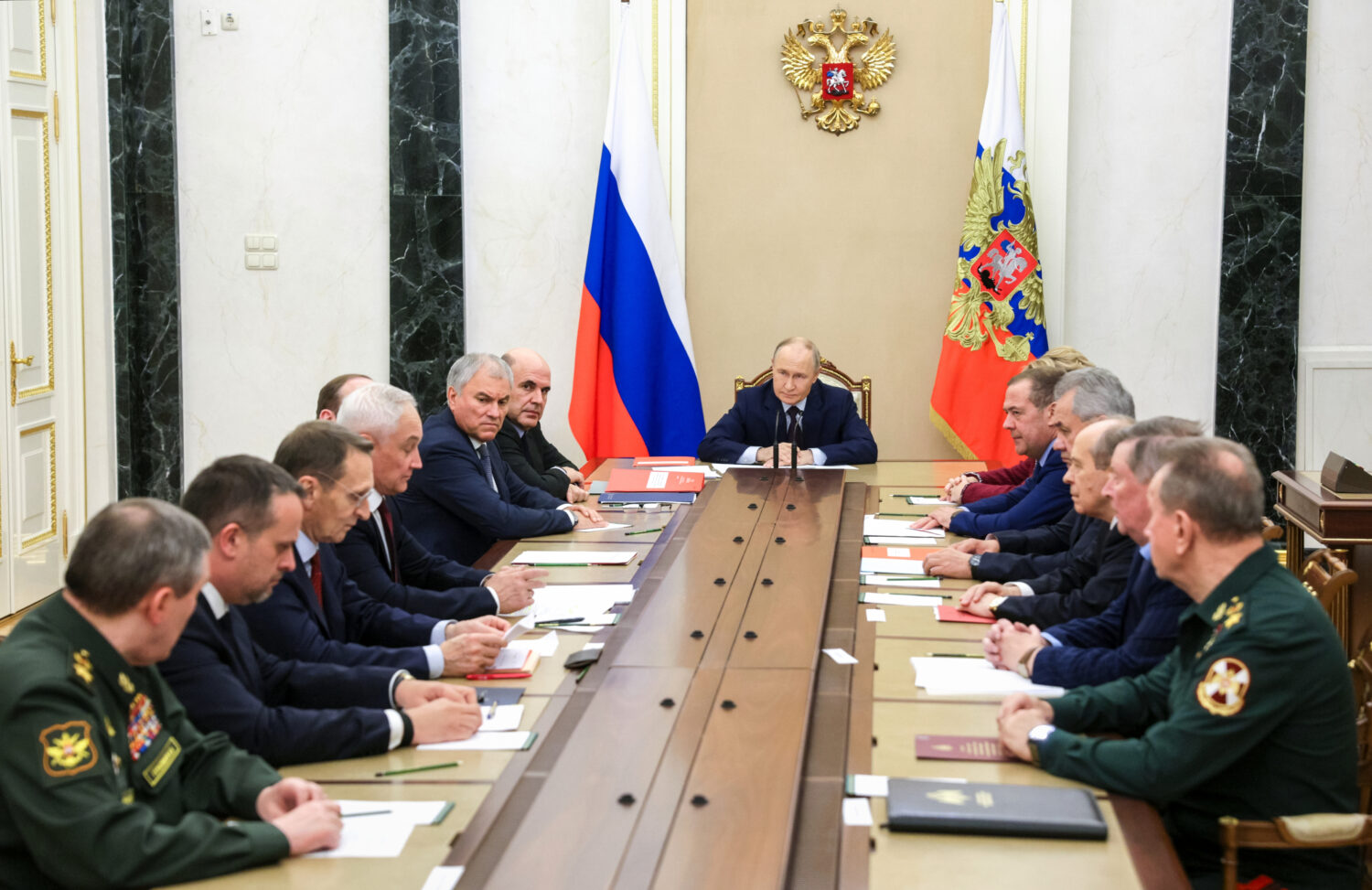 Russian President Vladimir Putin chairs a meeting with members of the Security Council in Moscow, R...