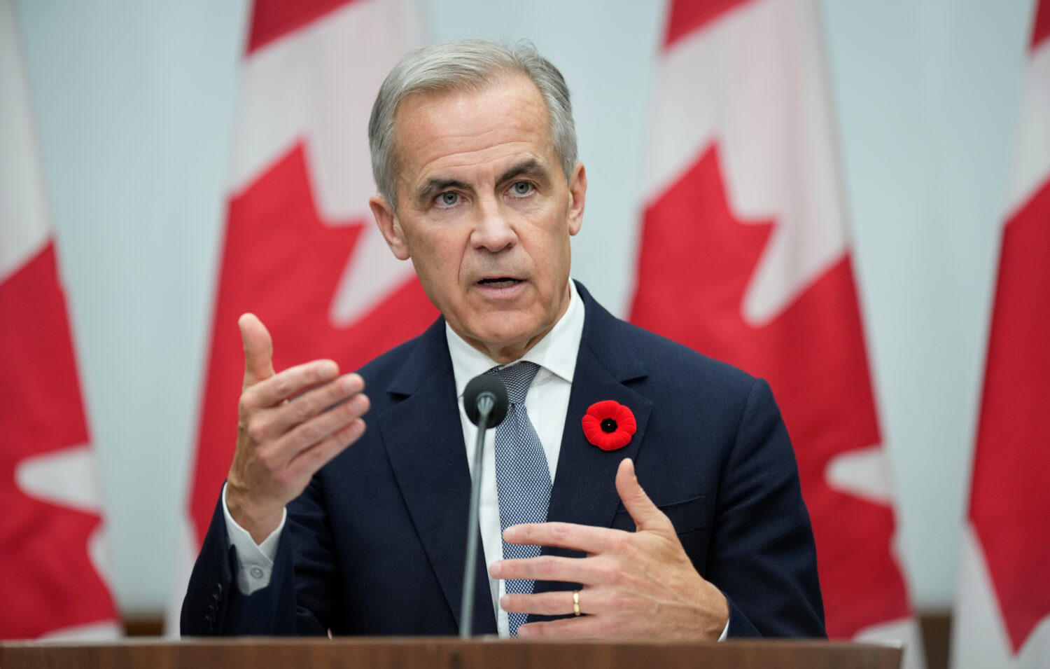 Canada's Prime Minister Mark Carney speaks during a news conference following the APEC Summit in Gy...