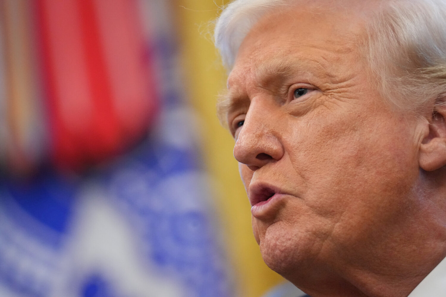 President Donald Trump speaks to reporters after Vice President JD Vance swore in U.S. Ambassador t...