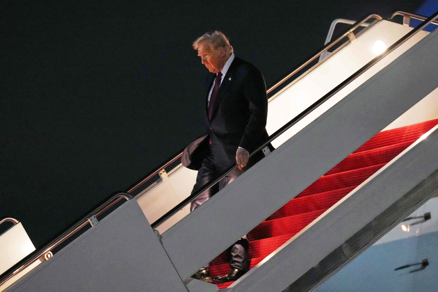 President Donald Trump walks off Air Force One, Wednesday, Nov. 5, 2025, at Joint Base Andrews, Md....