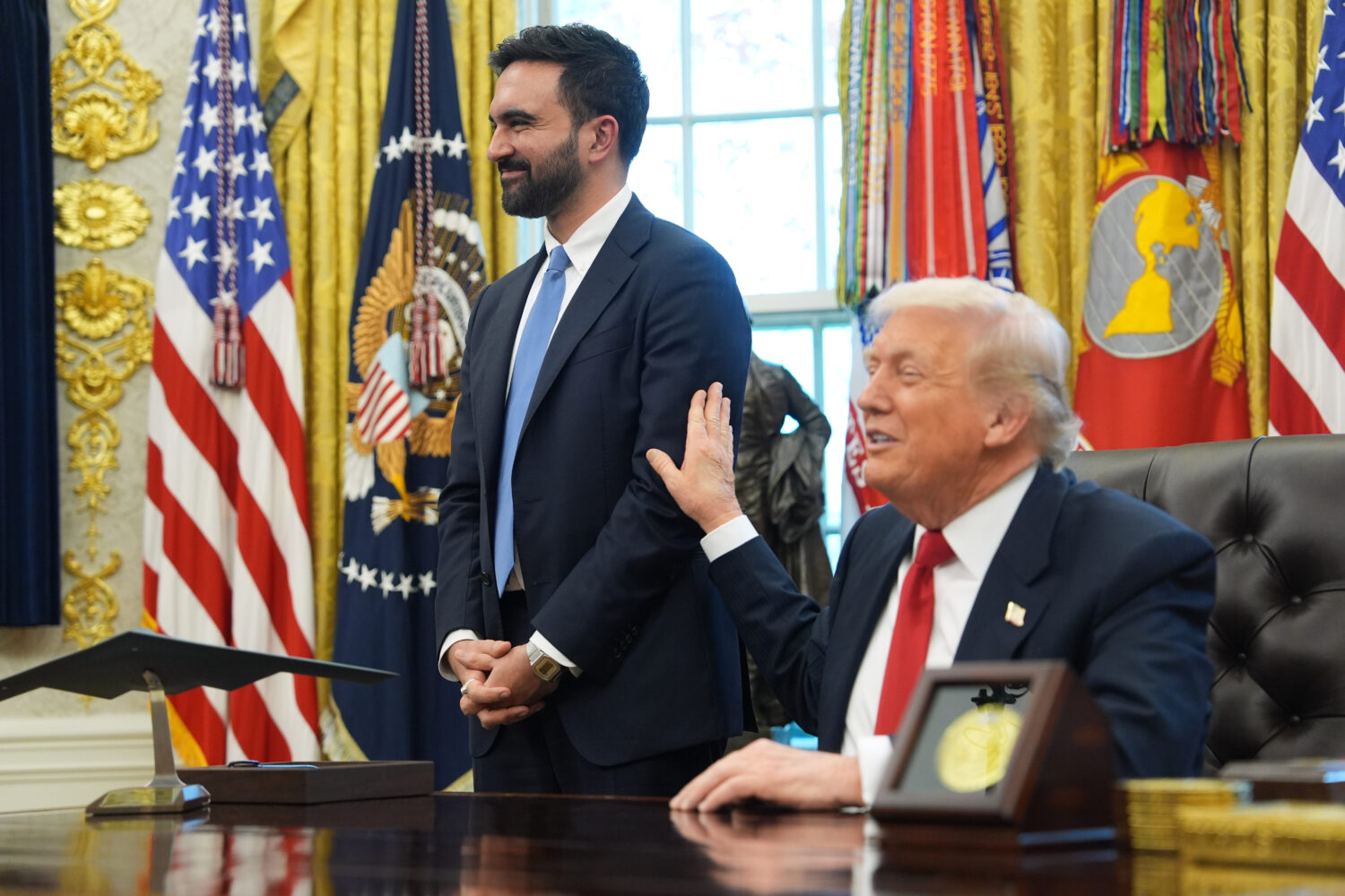 President Donald Trump talks after meeting with New York City Mayor-elect Zohran Mamdani in the Ova...