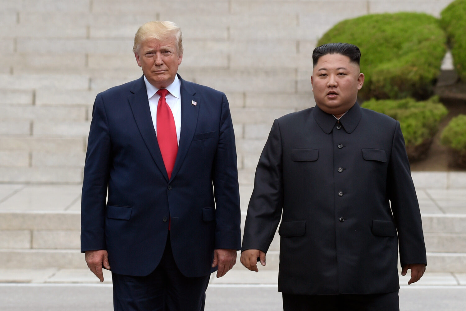 FILE - Then U.S. President Donald Trump, left, meets with North Korean leader Kim Jong Un at the No...