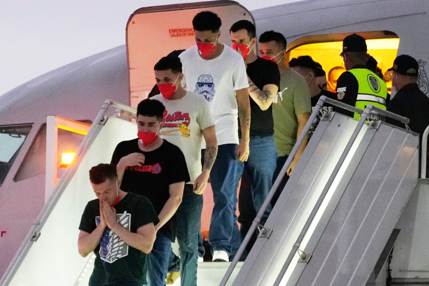 FILE - Migrants deported months before by the United States to El Salvador under the Trump administ...