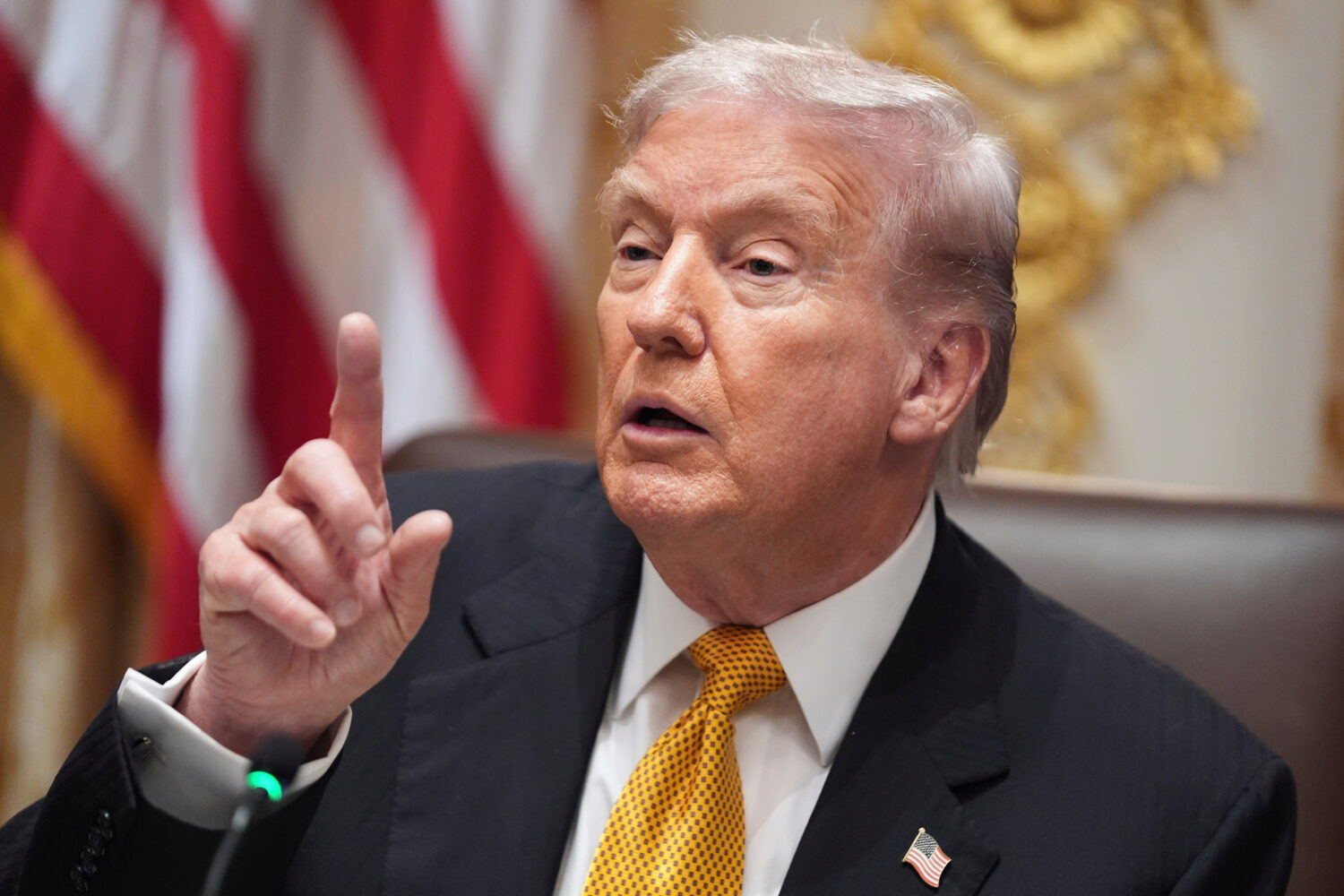 FILE - President Donald Trump speaks with reporters in the Cabinet Room of the White House, Nov. 7,...