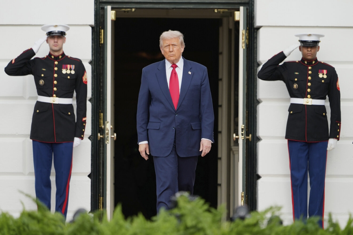 President Donald Trump waits to welcome Saudi Arabia's Crown Prince Mohammed bin Salman to the Whit...