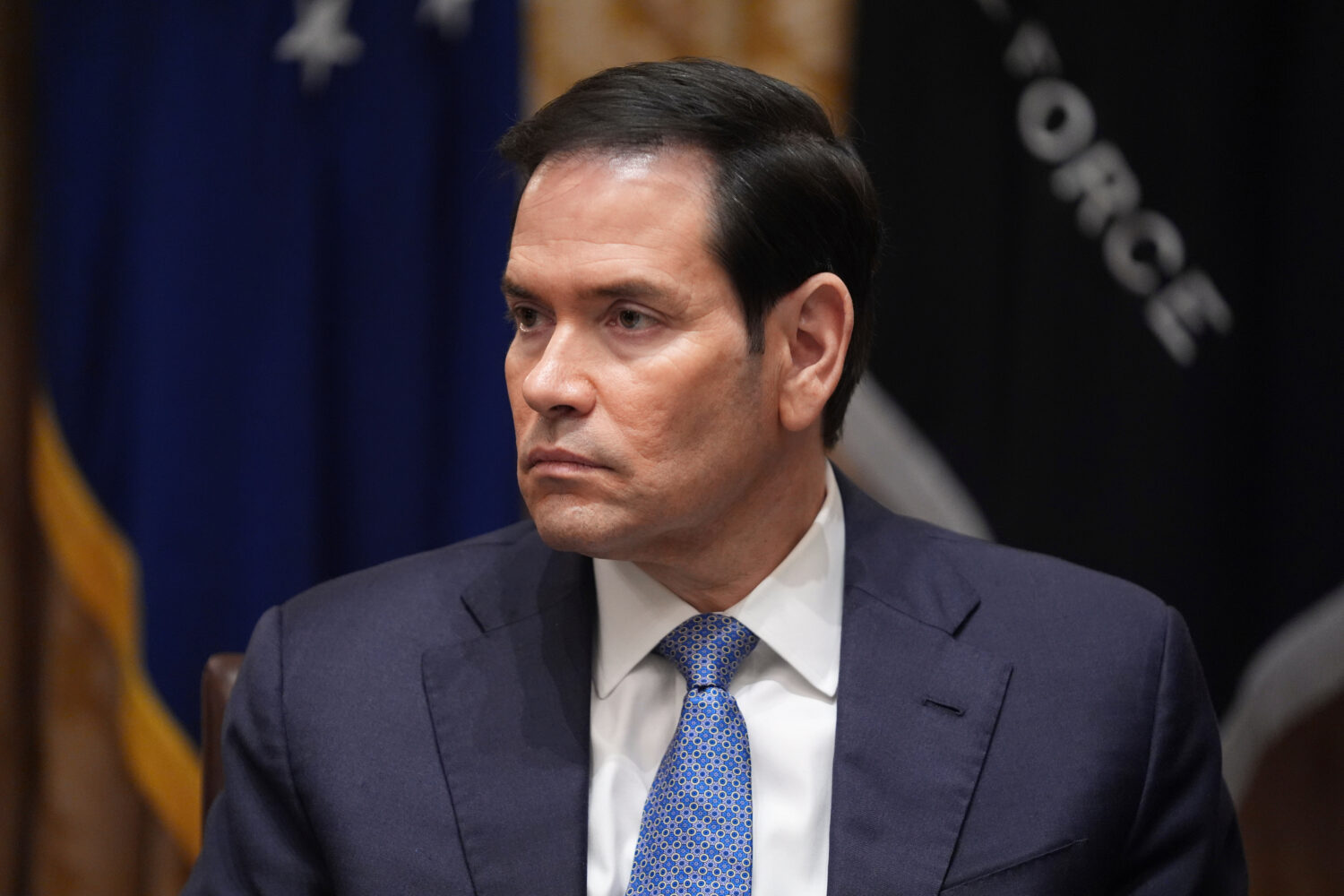 Secretary of State Marco Rubio listens as President Donald Trump meets with Hungary's Prime Ministe...
