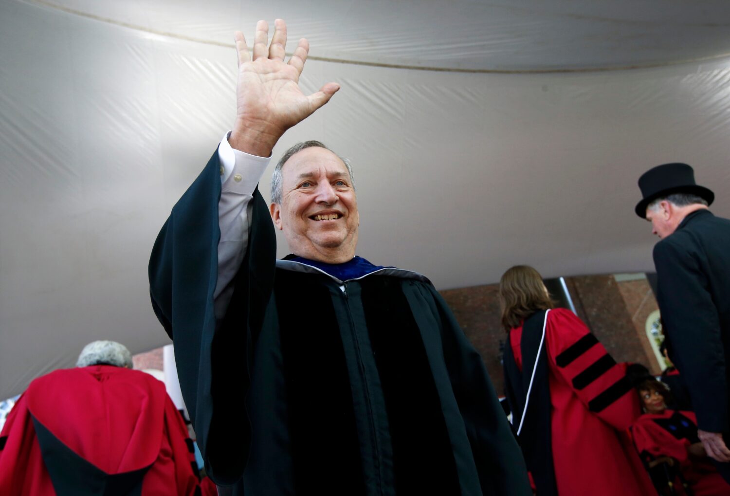 FILE -Former Harvard University president Larry Summers waves during Harvard commencement exercises...