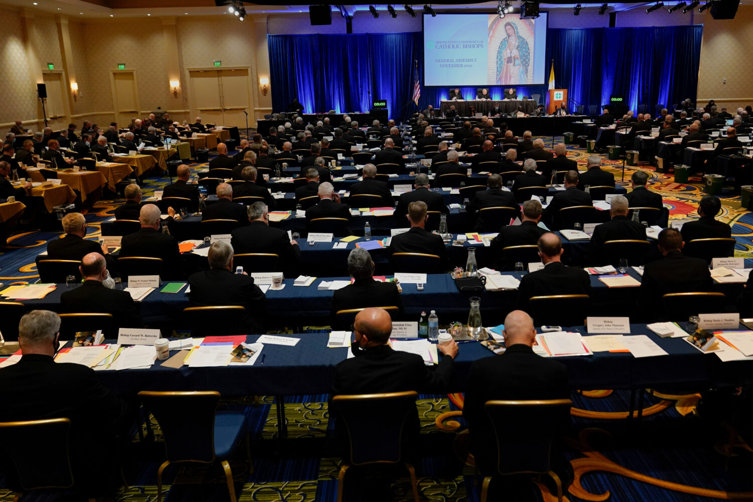 FILE - Clergy attend the Fall General Assembly meeting of the United States Conference of Catholic ...