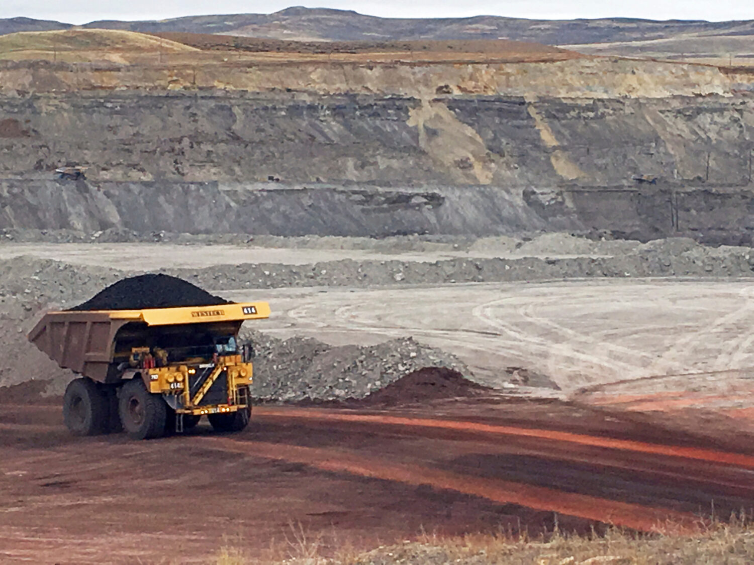 FILE - A dump truck hauls coal at the Eagle Butte Mine, now owned by Eagle Specialty Materials, LLC...
