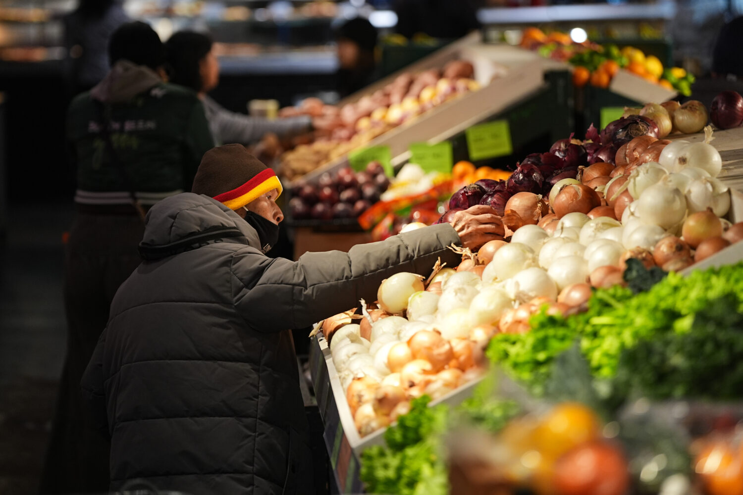 Customers shop at the Reading Terminal Market in Philadelphia, Wednesday, Oct. 29, 2025. (AP Photo/...
