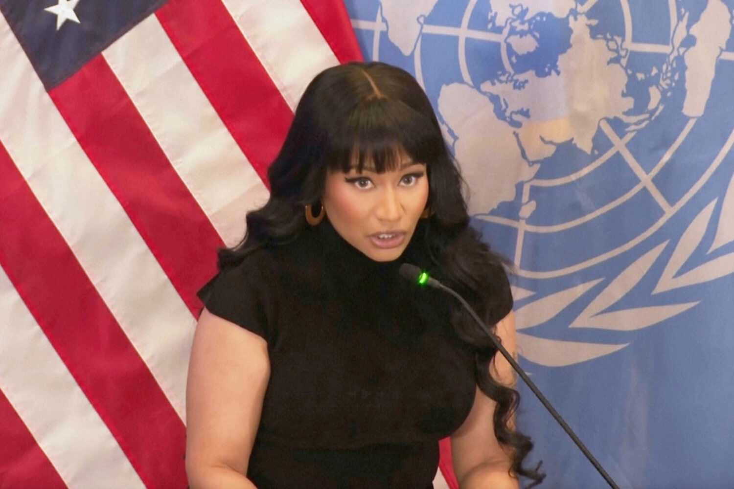 In this image taken from video, pop star Nicki Minaj joined faith leaders Tuesday Nov. 18, 2025, at...