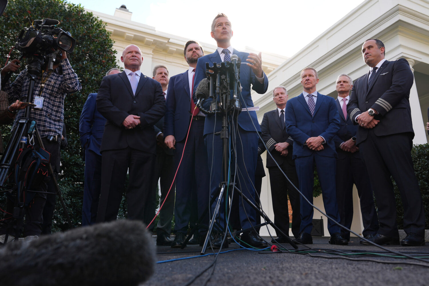 Transportation Secretary Sean Duffy speaks to the media alongside Sean O'Brien, President of the In...