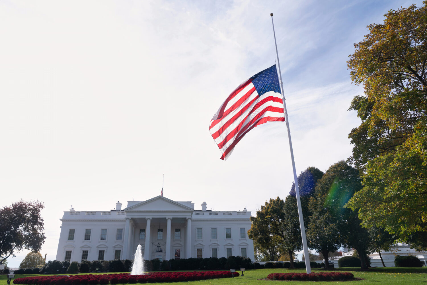 The American flag is seen at half-staff, Tuesday, Nov. 4, 2025, at the White House in Washington. (...