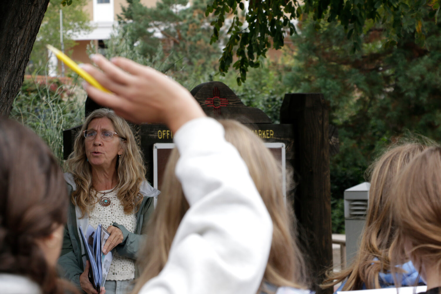 Lisa Nordstrum, a history teacher at Santa Fe Preparatory School, asks questions during a field tri...