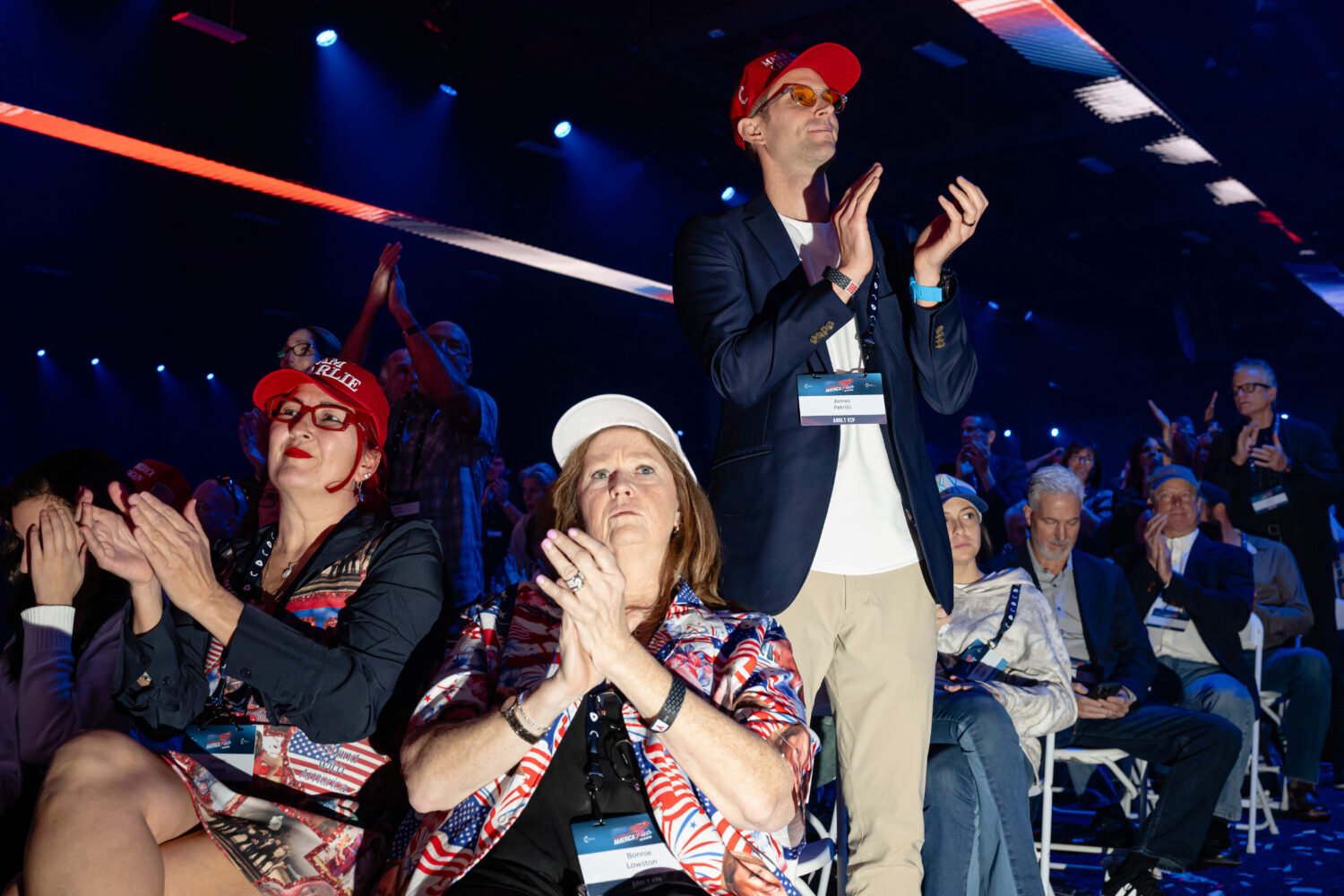 Attendees applaud during Turning Point USA's AmericaFest 2025, Saturday, Dec. 20, 2025, in Phoenix....