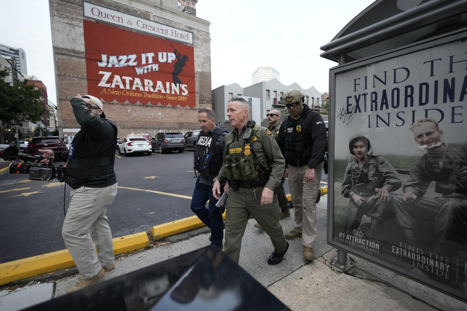 U.S. Border Patrol Commander at large Gregory Bovino, 3rd left, walks on the street in New Orleans,...