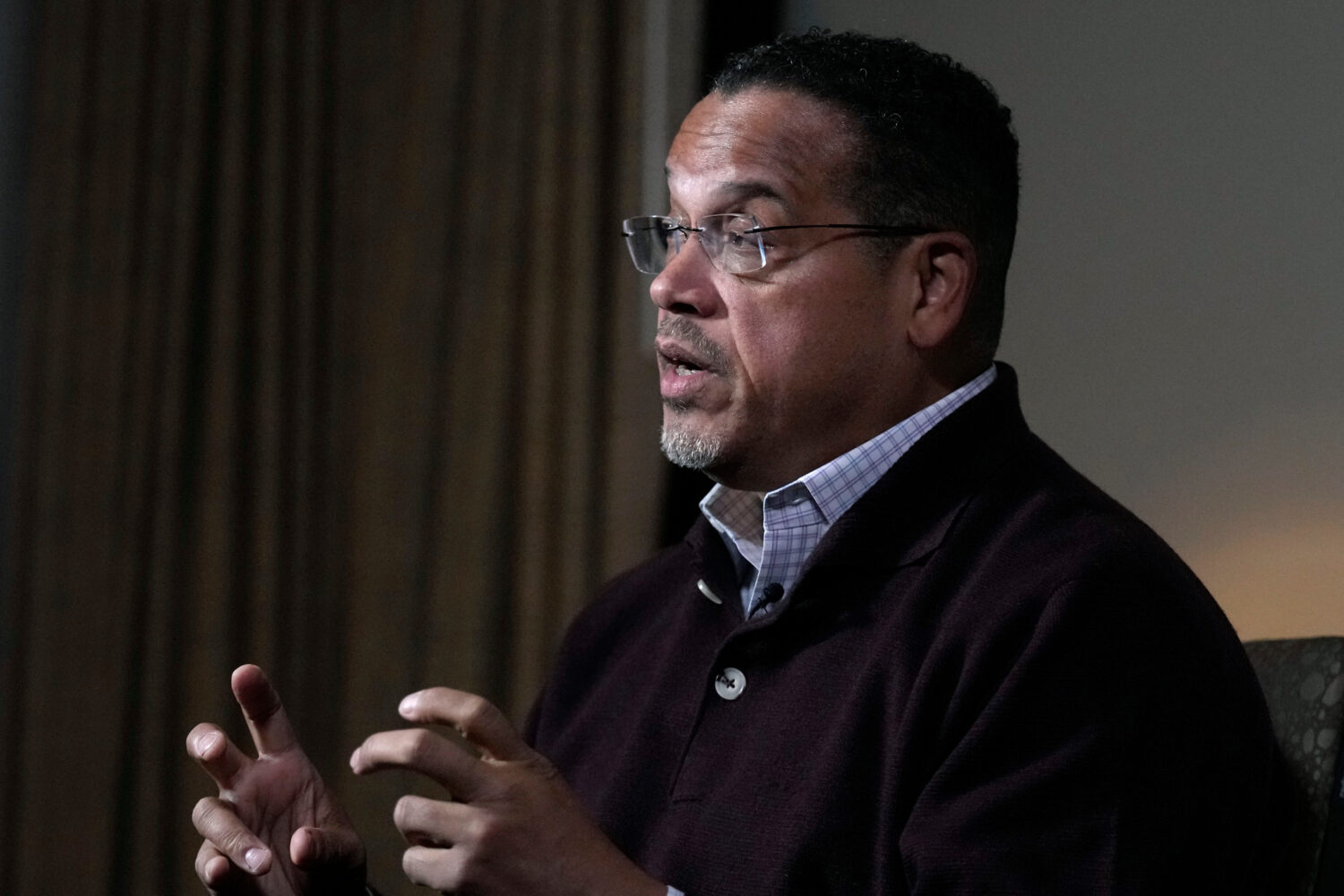 FILE - Keith Ellison, Attorney General of Minnesota, answers a question during an interview at the ...