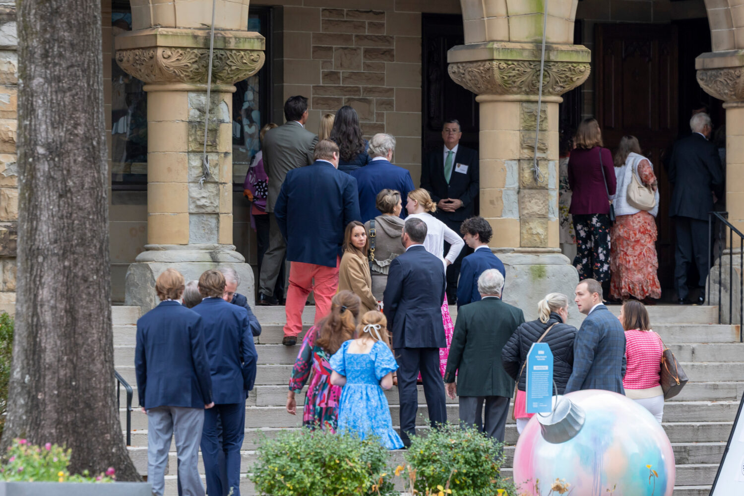 People arrive for a funeral service for Brown University shooting victim Ella Cook, Monday, Dec. 22...