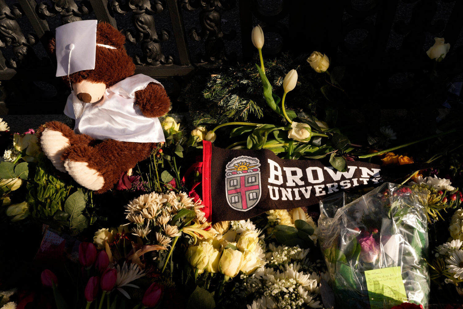 A makeshift memorial is seen on the campus of Brown University, close to from the scene of the shoo...