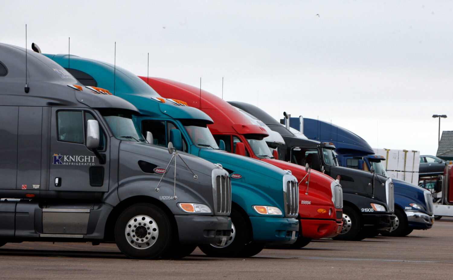 FILE - Big rigs stack up at the Flying J Truck Stop along Interstate 70 near the small Colorado pla...