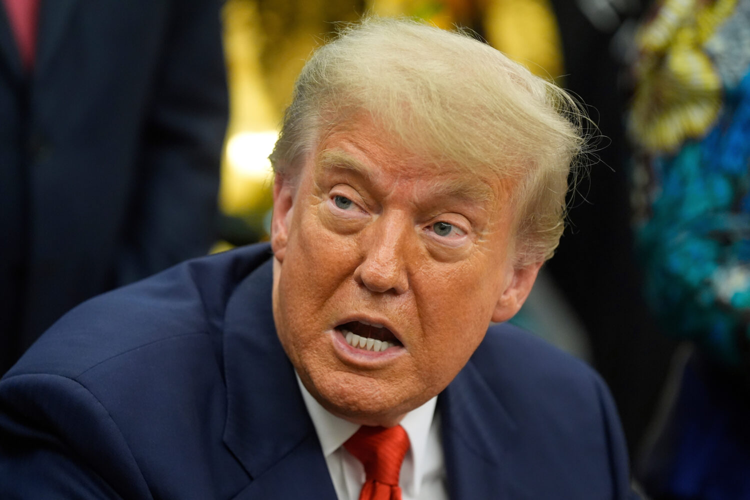 FILE - President Donald Trump answers questions from reporters as he meets with Congo's Foreign Min...