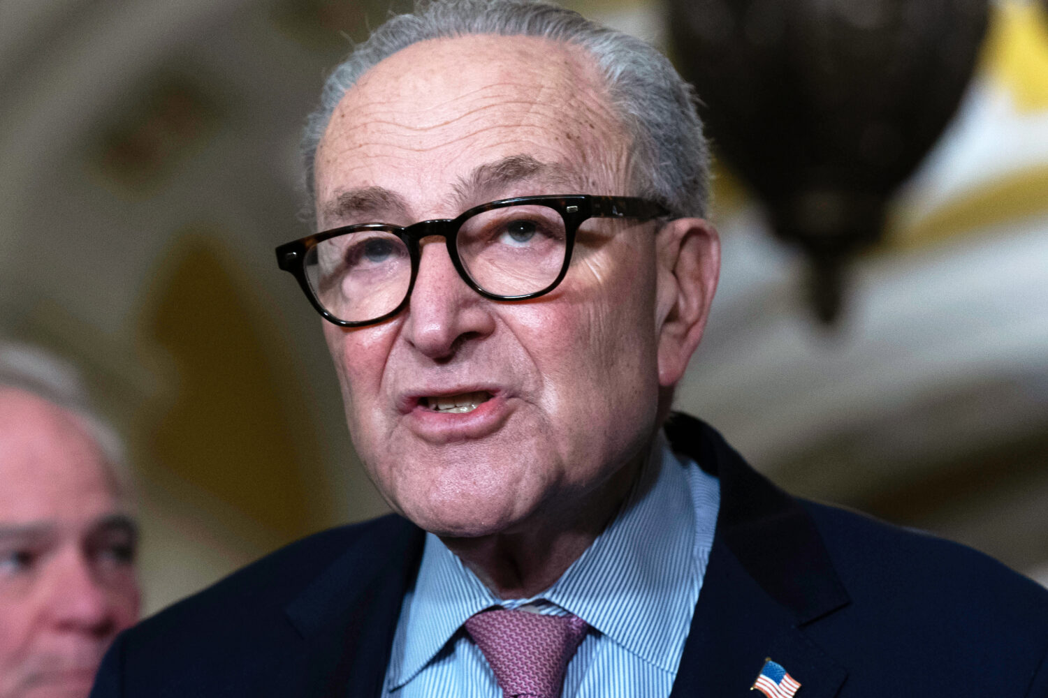 Senate Minority Leader Chuck Schumer, D-N.Y., speaks to reporters following the weekly policy lunch...