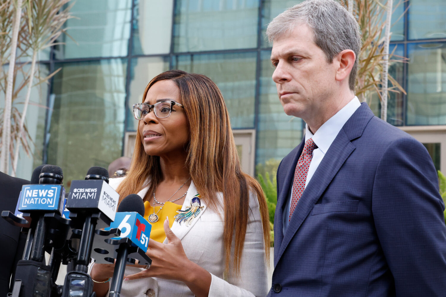CORRECTS TO HEARING, NOT ARRAIGNMENT - U.S. Rep. Sheila Cherfilus-McCormick, D-Fla., left, speaks t...