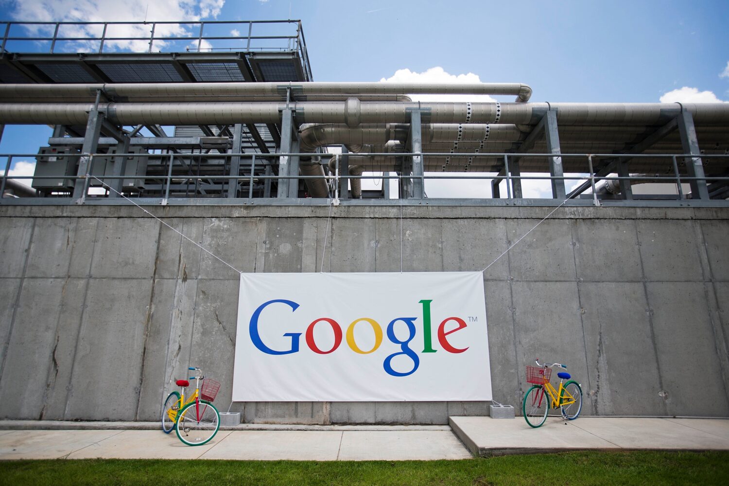 FILE -- A banner hangs during a ceremony announcing a proposed $300 million expansion of Google's d...