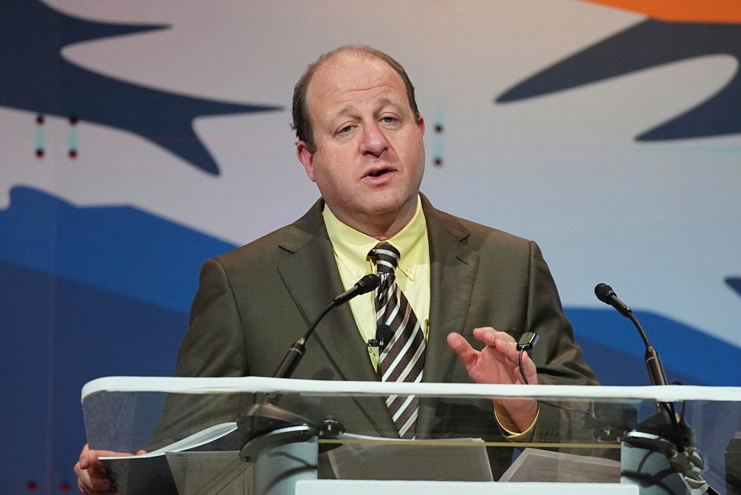FILE - Colorado Gov. Jared Polis speaks to the National Governors Association at the Broadmoor Hote...
