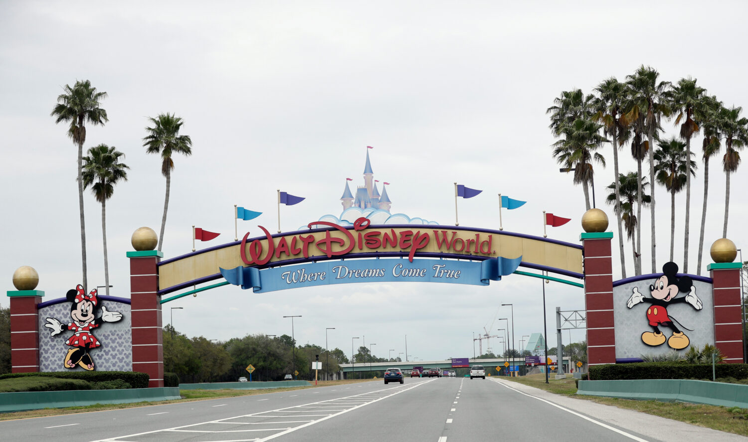 FILE - The road to the entrance of Walt Disney World, Monday, March 16, 2020, in Lake Buena Vista, ...