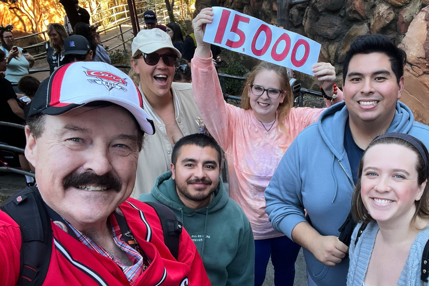 In this photo provided by Jon Alan Hale, Hale, left, poses with friends after taking his 15,000th R...