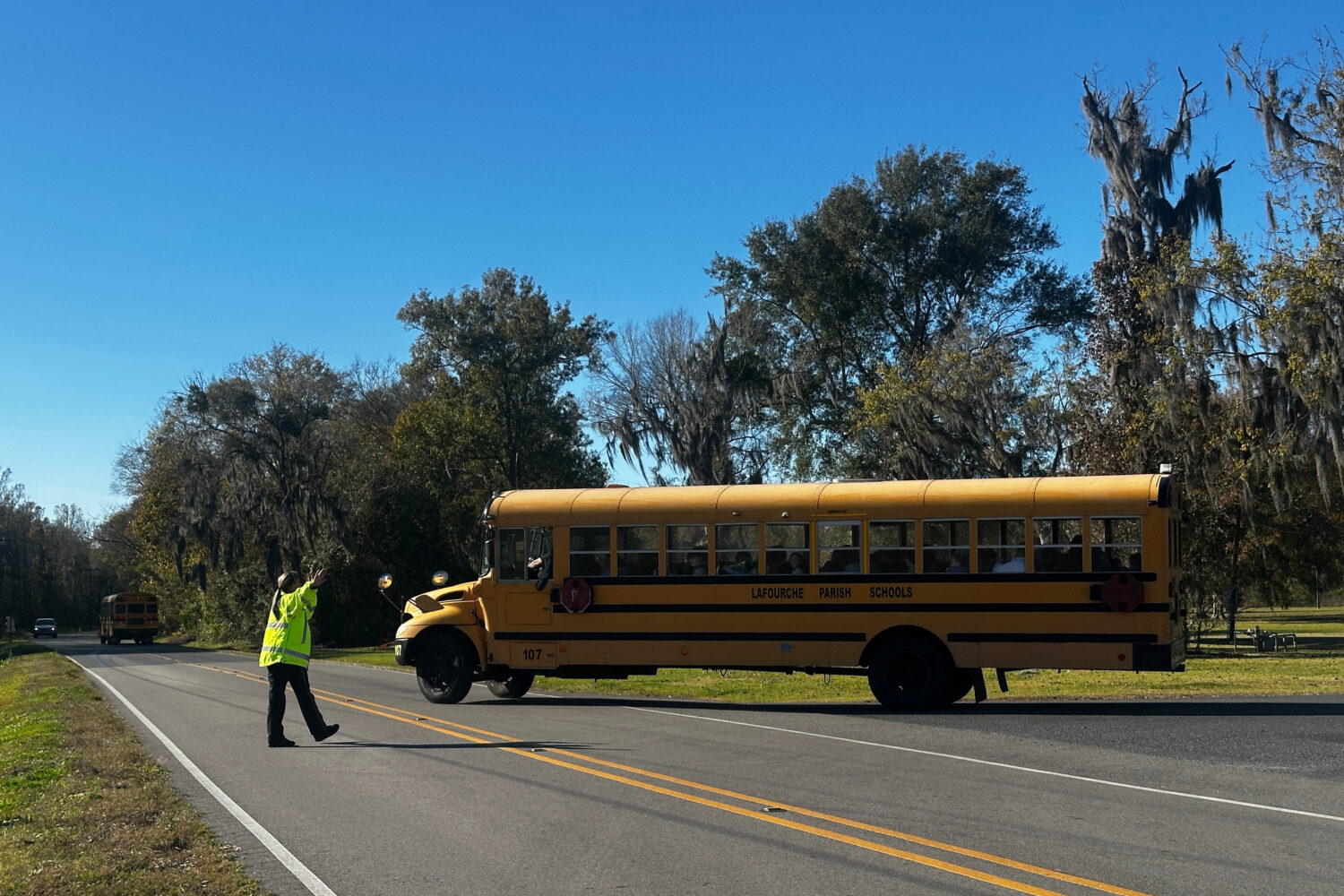 A school bus carries children at the end of a school day at Sixth Ward Middle School in Thibodaux, ...
