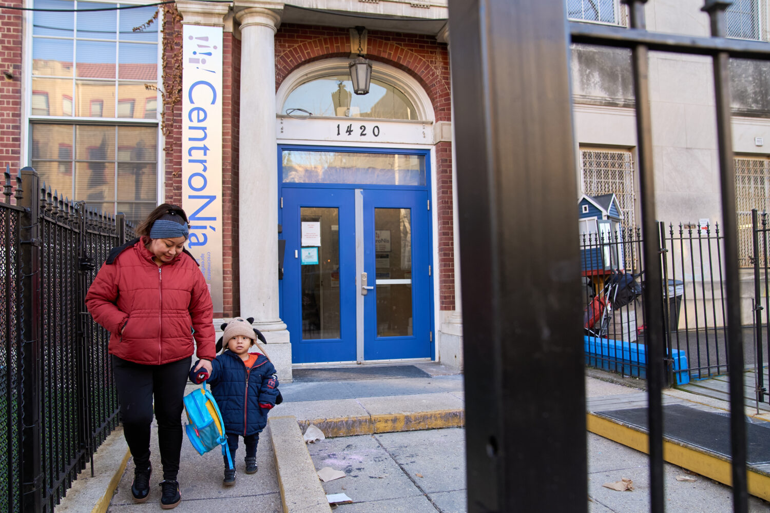 Families leave CentroNia at the end of the school day in Washington, Tuesday, Dec. 9, 2025. (AP Pho...